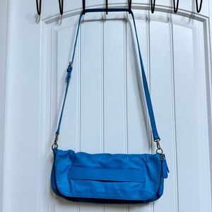 Popcorn Blue Leather Shoulder Bag and Clutch.